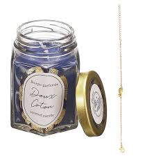 bougie au coton  avec bracelet a l'intérieur